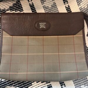 Burberrys brown leather and plaid clutch